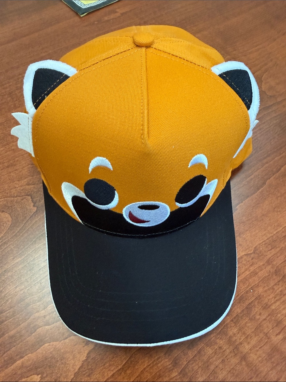 Panda and friends red panda cap- Orange and Black from Singapore Zoo